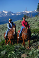 Horseback riding in mountains; Actual size=130 pixels wide